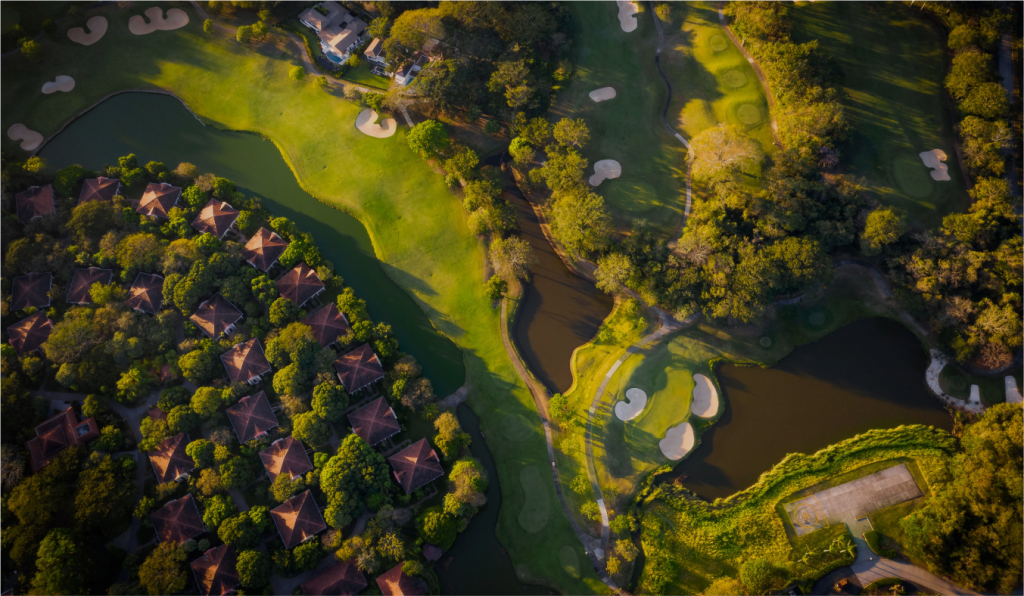 Aerie view of the meandering fairways and verdant greenery at the Reserva Conchal golf course.