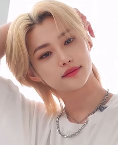 This contain an image of Stray Kids' Felix