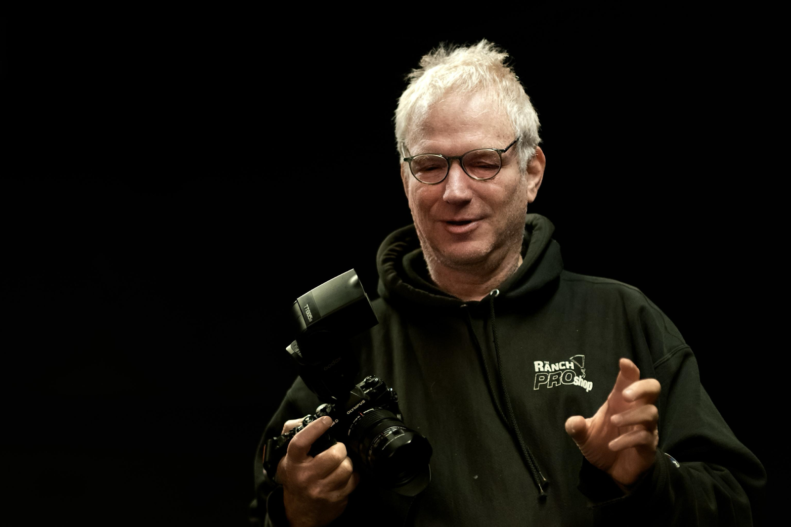 Portrait of Ran Fuchs with some of his equipment