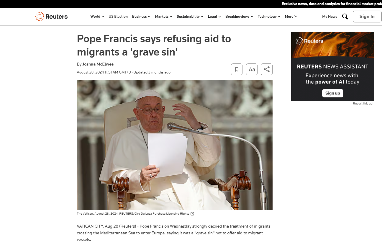 A person in a white robe reading a paper

Description automatically generated