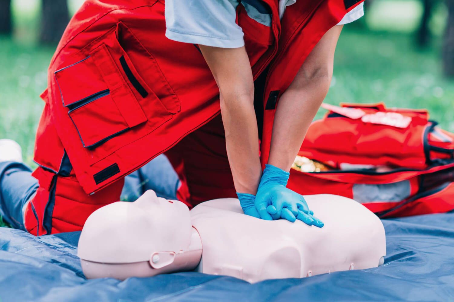 instructor showing correct CPR technique 