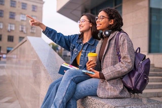 Women students at a community college show the concept of a student's mental health