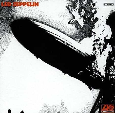 Led Zeppelin's debut album cover featuring a black-and-white image of the Hindenburg airship in mid-crash, engulfed in flames and smoke.