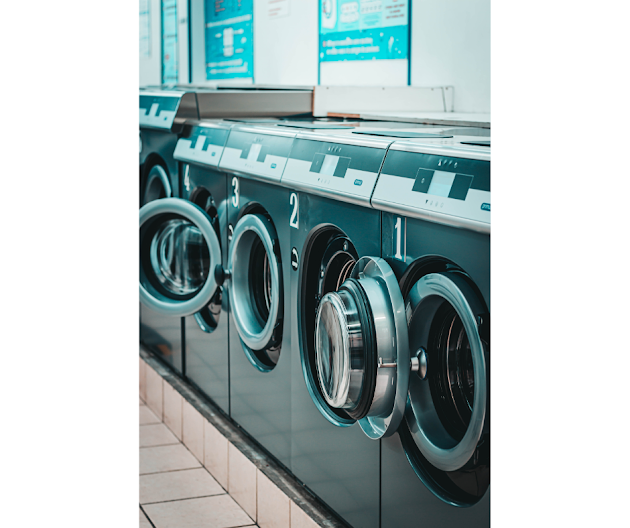 four Laundromat machines
