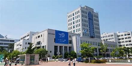 A building with a blue banner

AI-generated content may be incorrect.