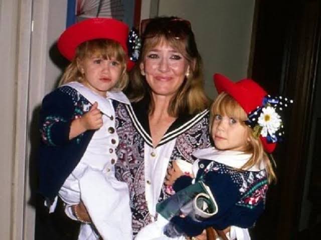 a younger Jarnette Olsen with her twins