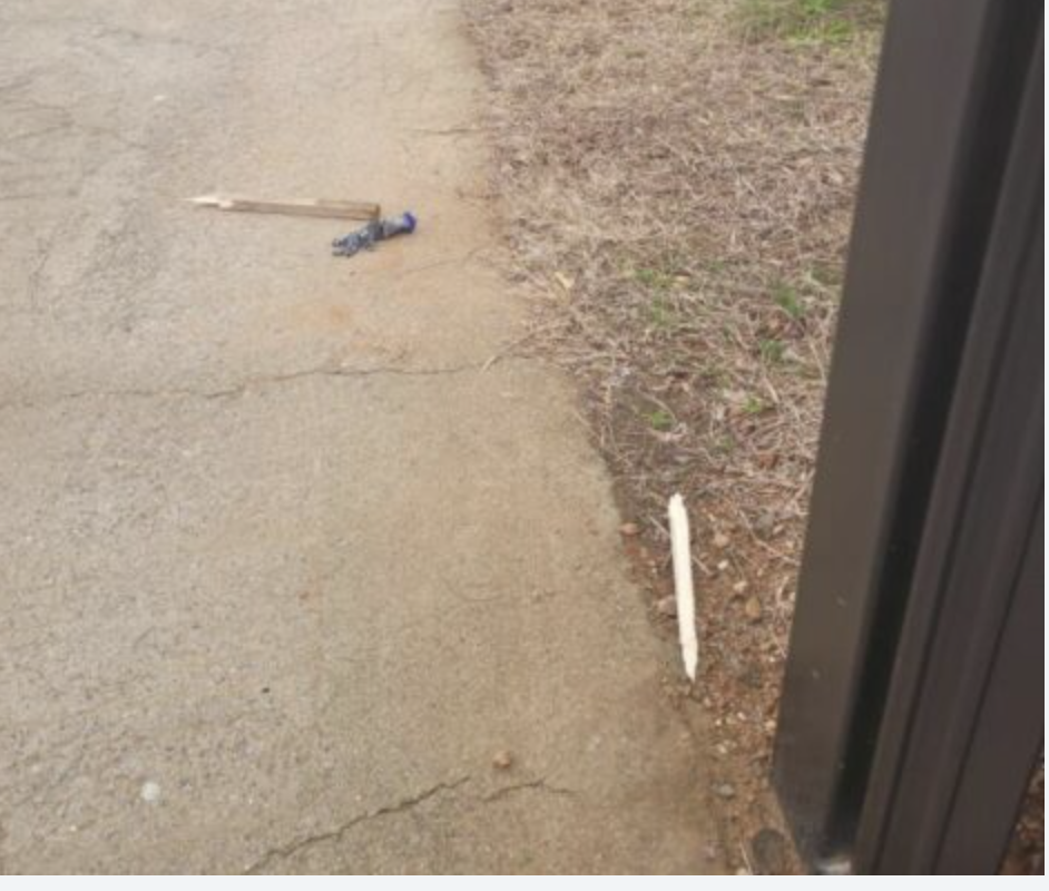 This image contains a picture of a broken wooden stick