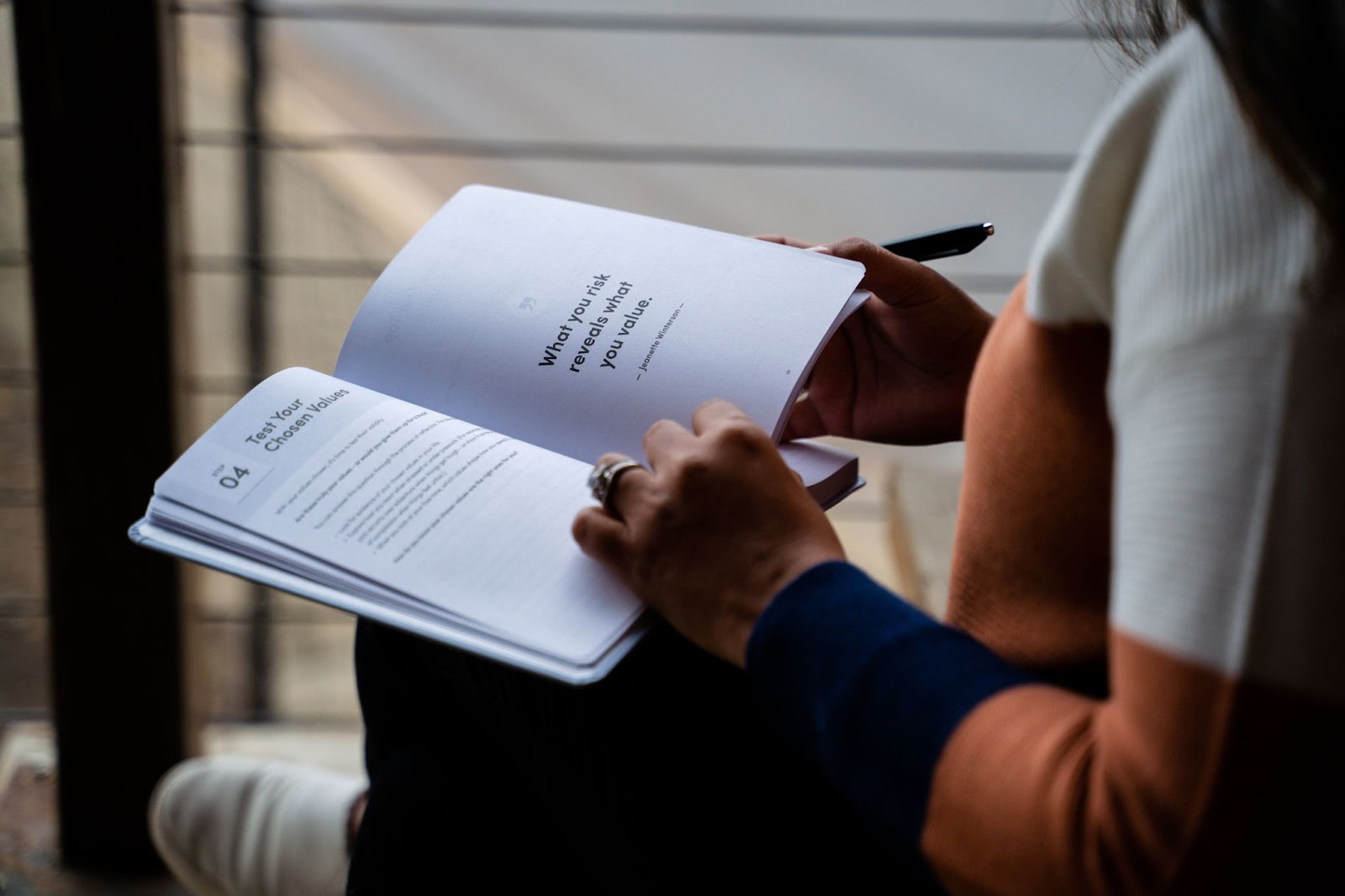 woman reading her core values journal