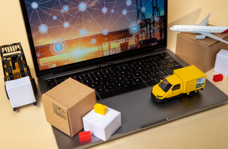Simulación de cadena logística digital en laptop con modelos de transporte y cajas