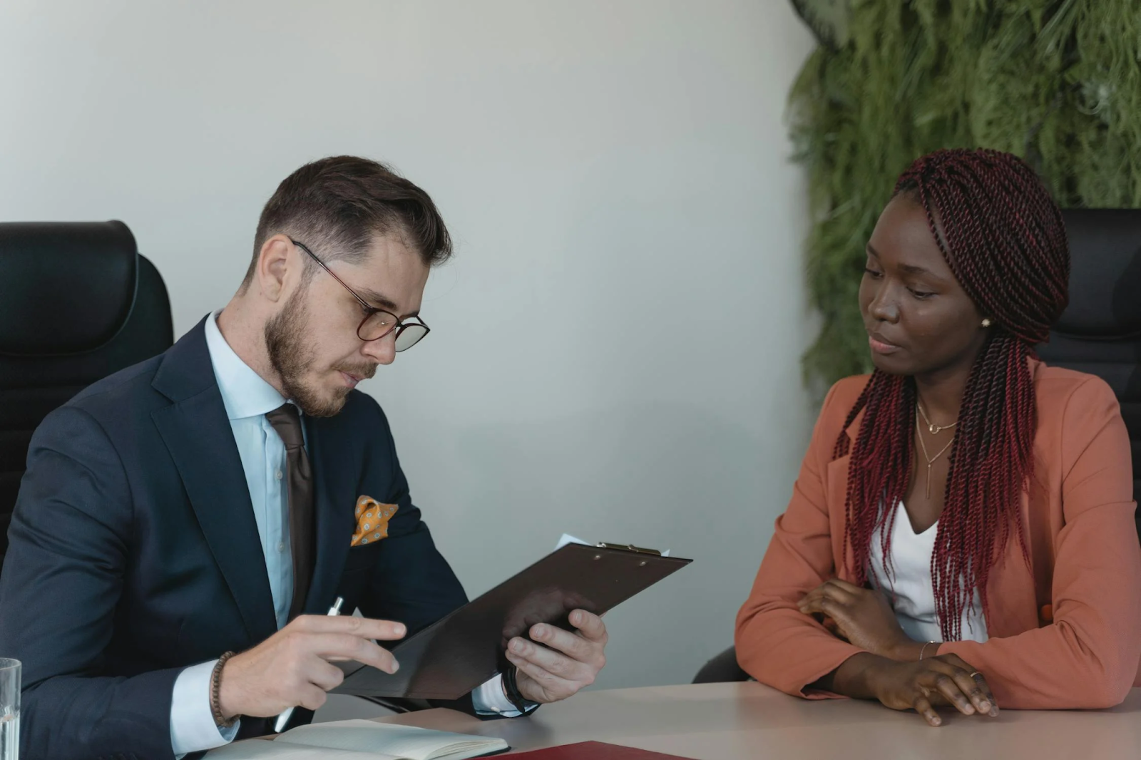 A man and woman in an interview session