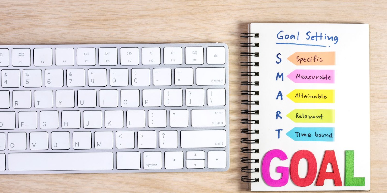  Notebook beside keyboard