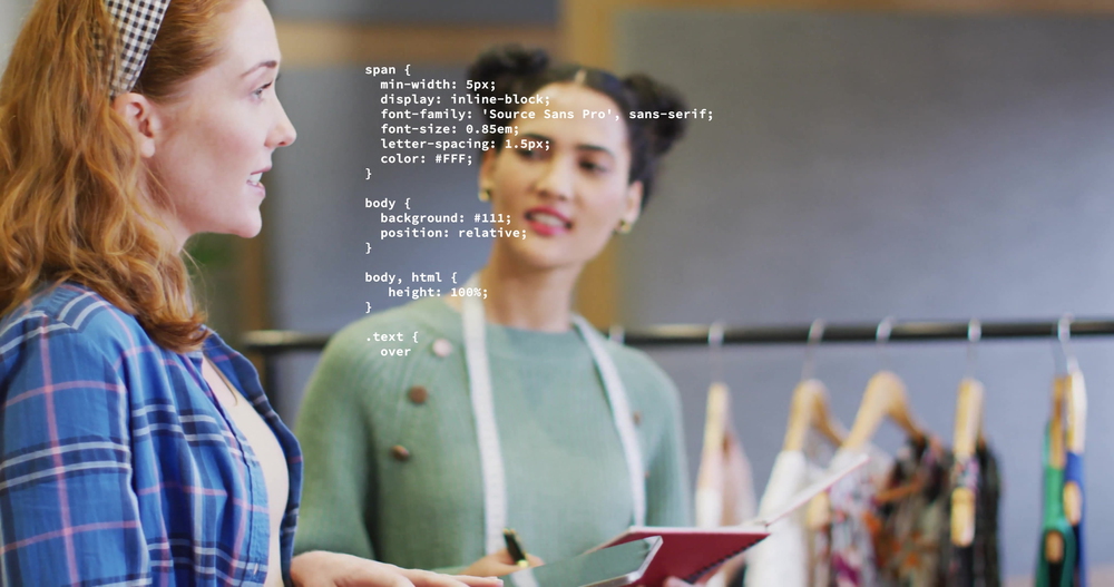 Business partners discussing the video API platform they’ve recently integrated into their website