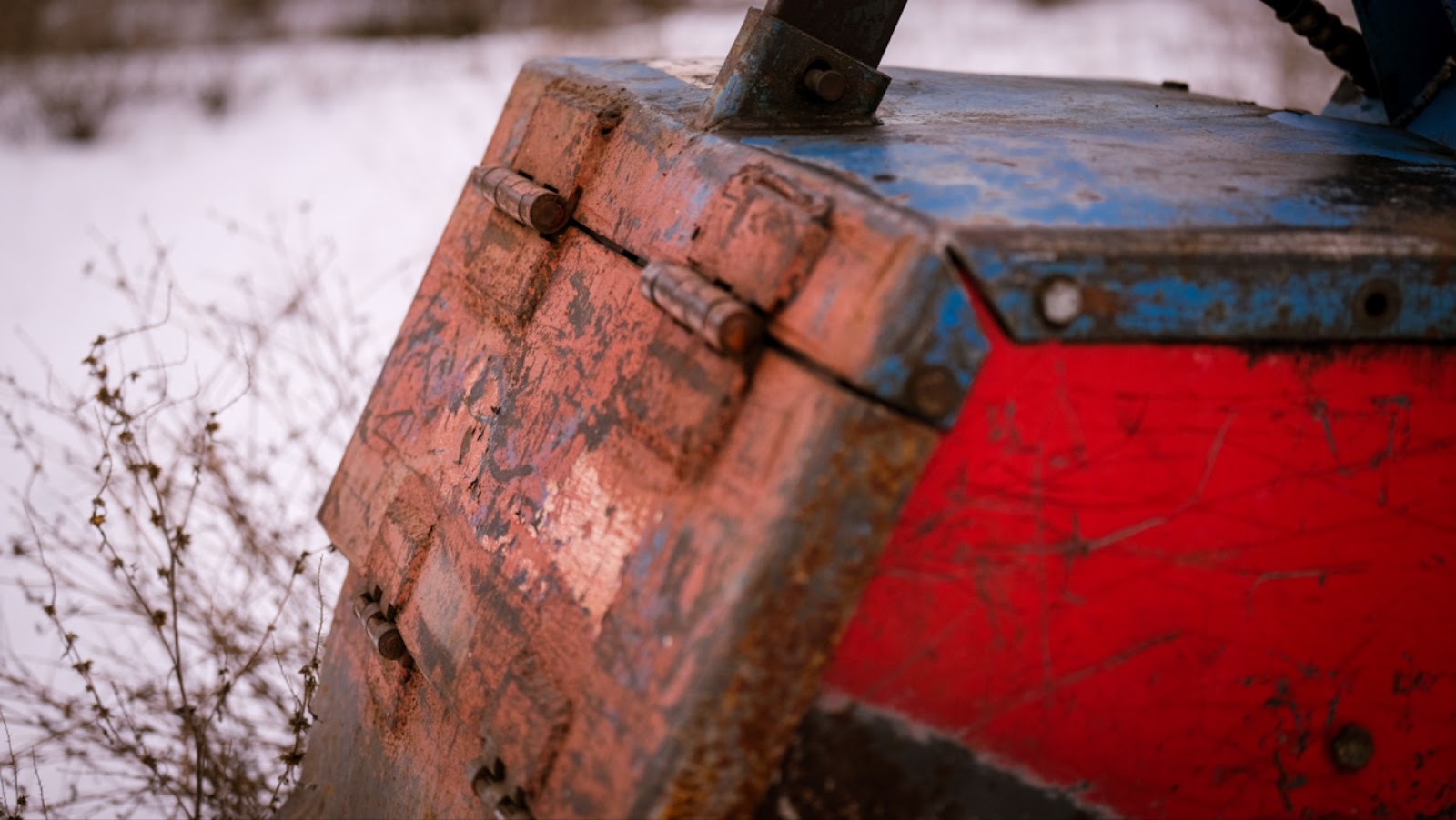 Close up of a blue Barreto tiller