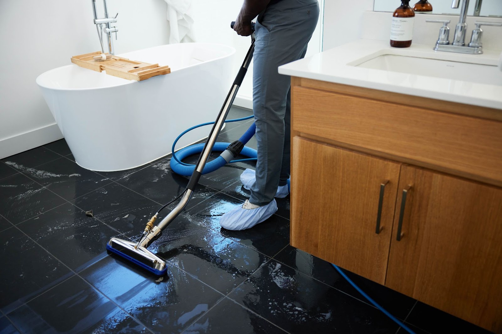 a man washing tile