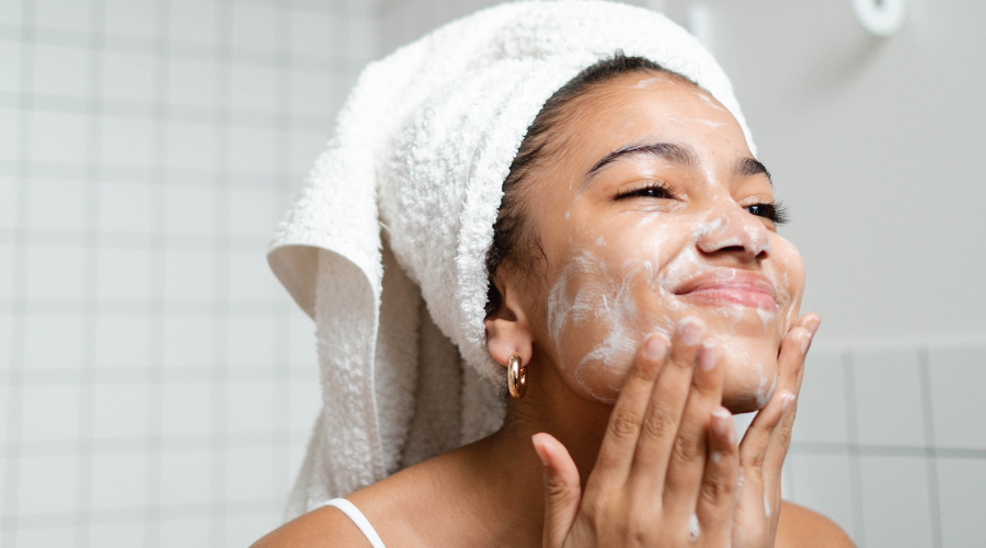 woman applying skincare for Hirsutism