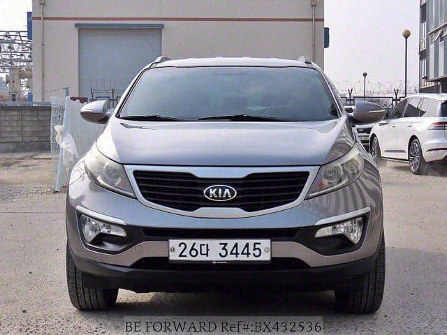 Kia Sportage R 
Front view
KIA logo 
Radiator grill