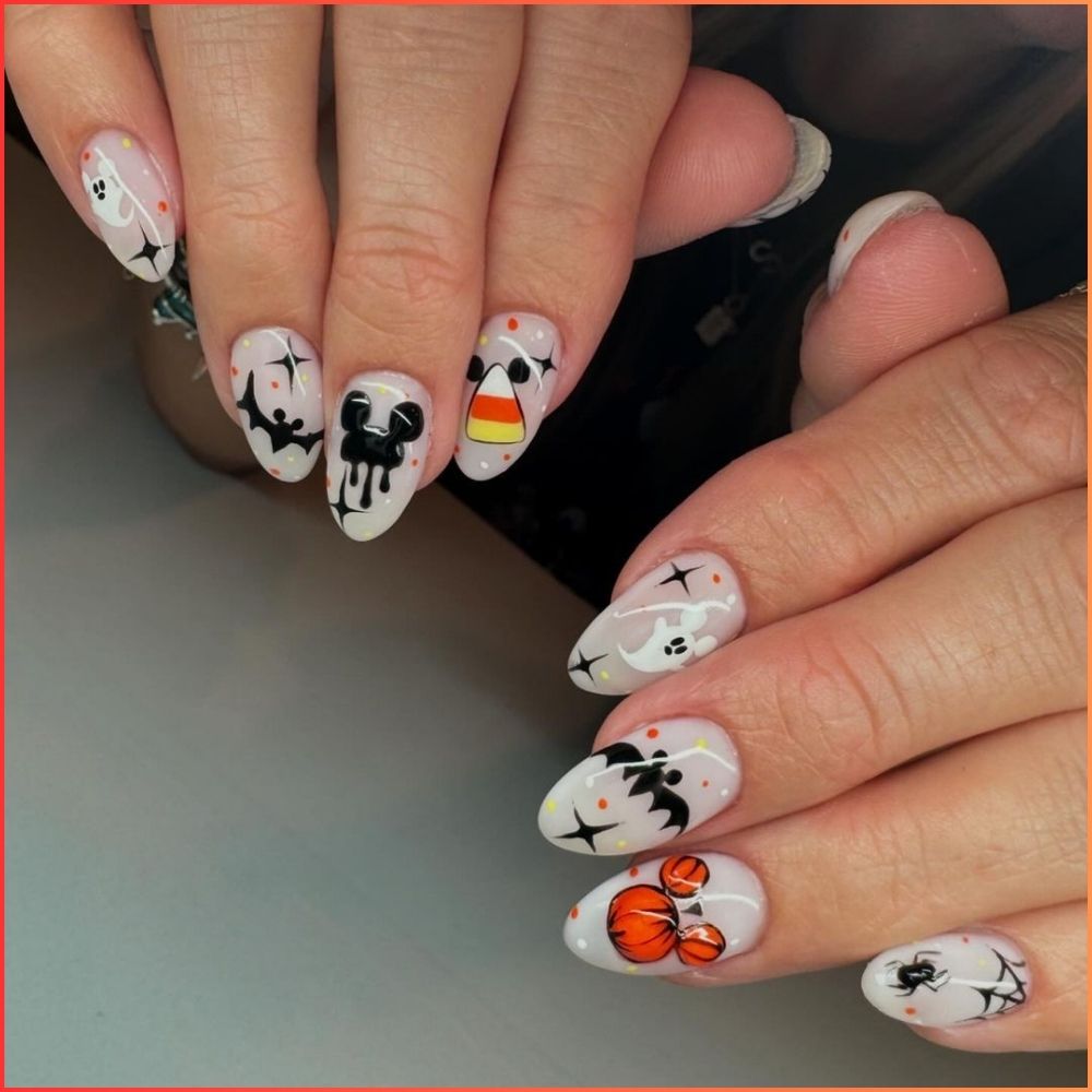 Close up of nails with spooky nails having Mickey Mouse Nails