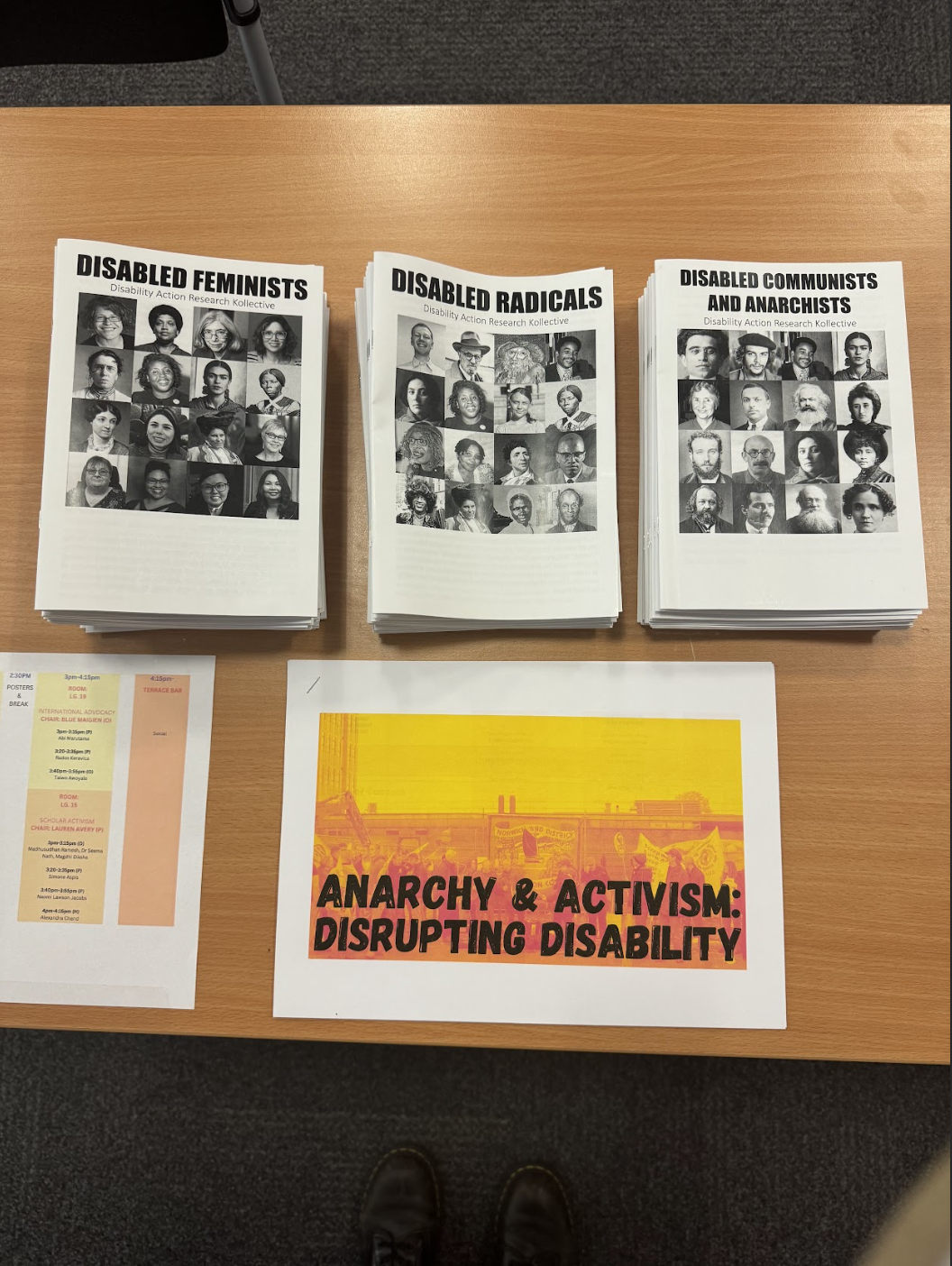 Printed leaflets on a table, reading: Disabled Feminists