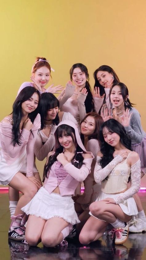 This contains an image of twice mgroup members