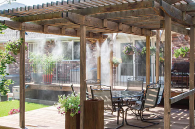 incorporating water features into your deck design misting system on wooden pergola custom built michigan