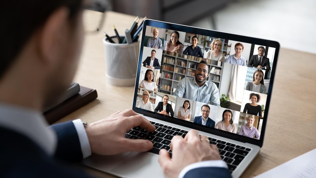 Remote work policy: entrepreneur having a video call with his team