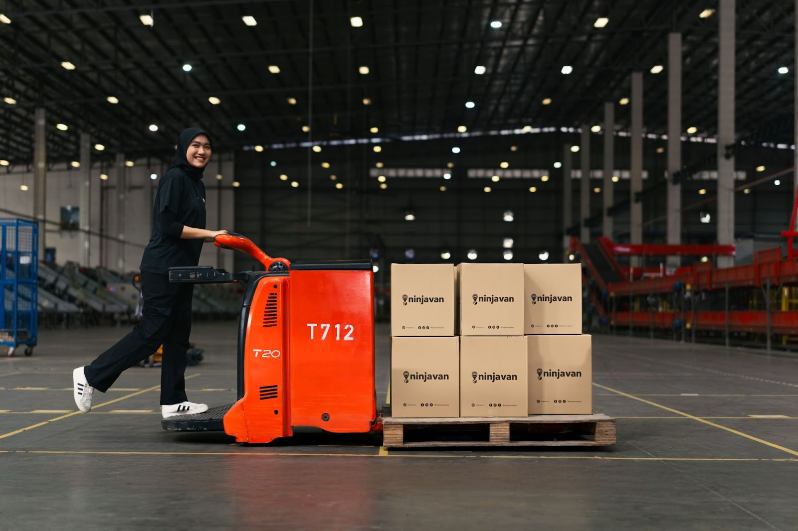 Ninja Van warehouse operations efficiently handling FMCG goods for faster order fulfillment.