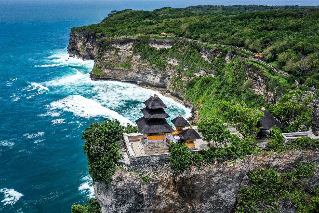 Uluwatu Temple In Bali: Famous Cliff Sunset At Uluwatu Bali