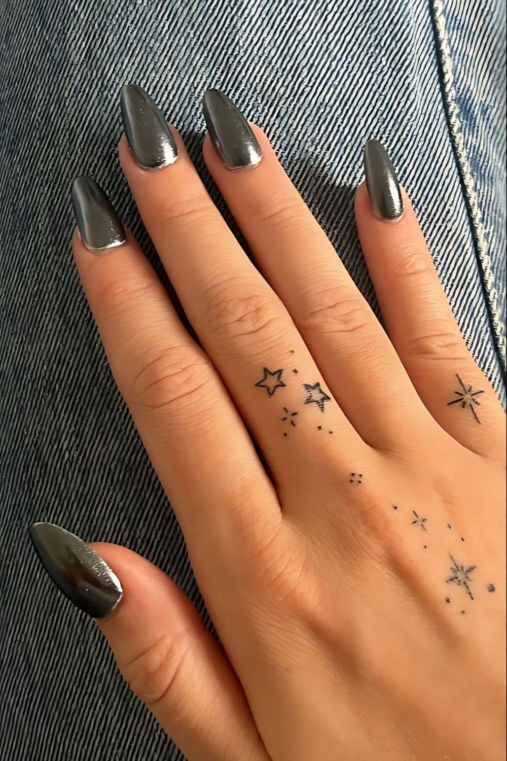 Star Finger Tattoo