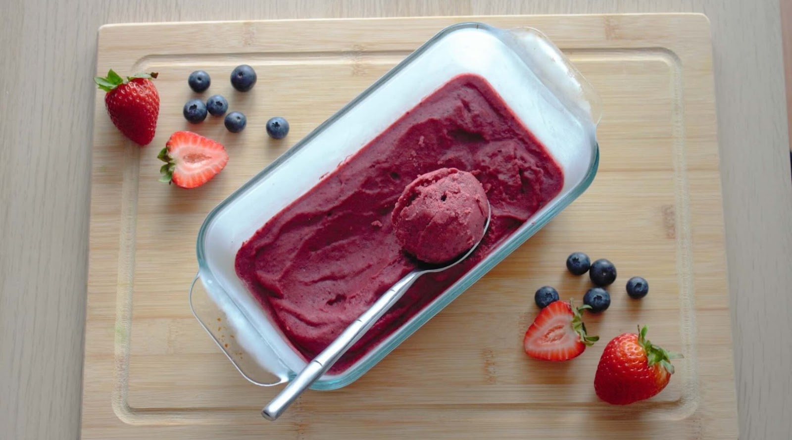 Express Sorbet Created by a Registered Dietitian on a Wooden Board with Strawberries and Blueberries