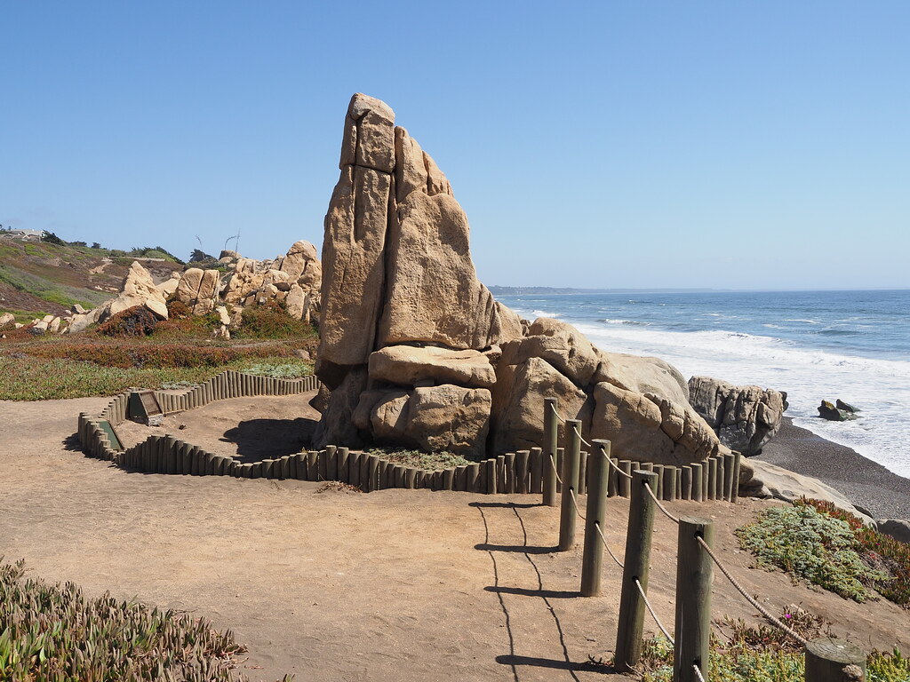 It's rock formation near the beach and it protected by small woods