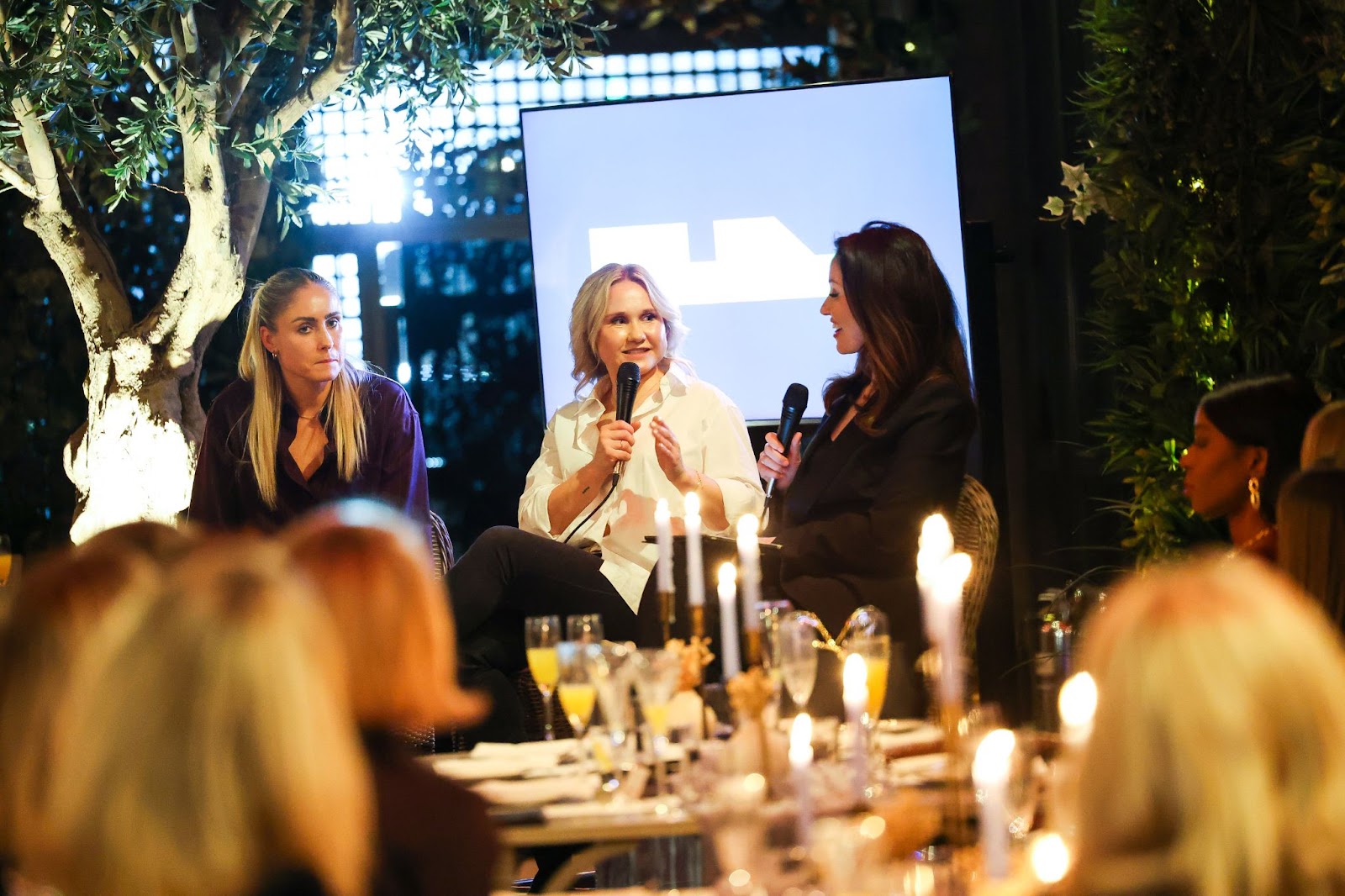 Powerful women collaborating at an event