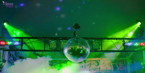 Disco ball with green strobe and LED lights, enhancing a vibrant, party setting.