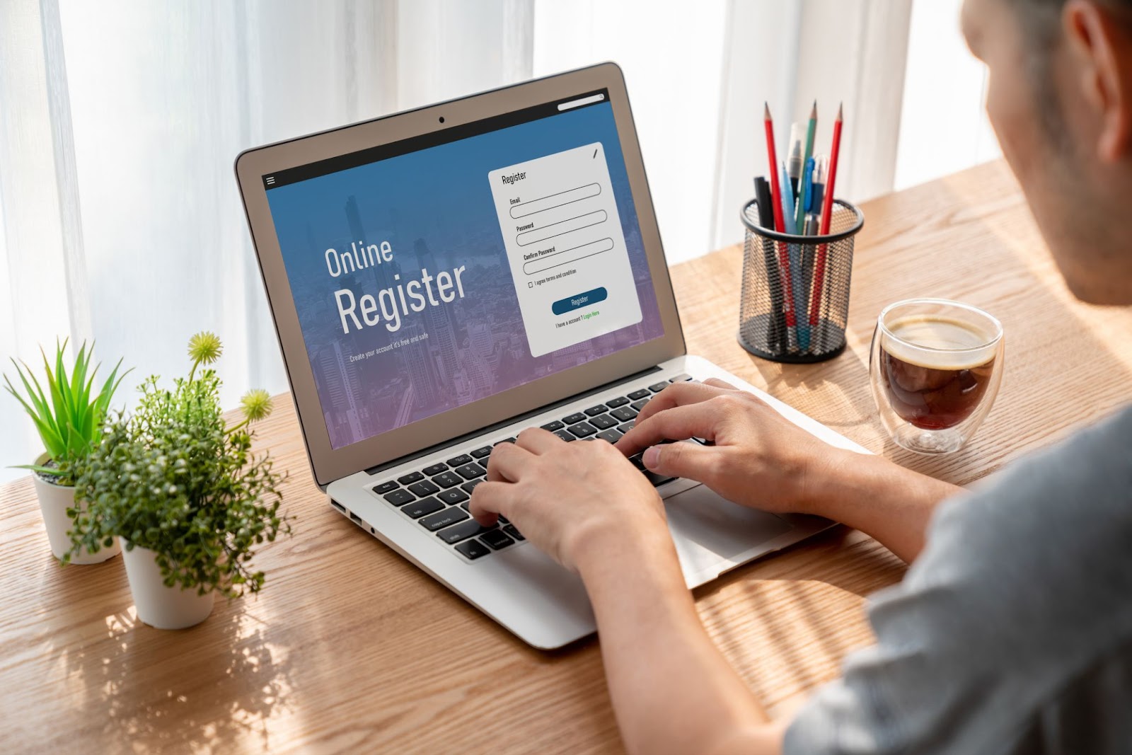 Man registering for an event on his computer