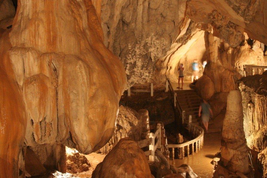 Stalactites and stalagmites inside Tham Chang Cave 