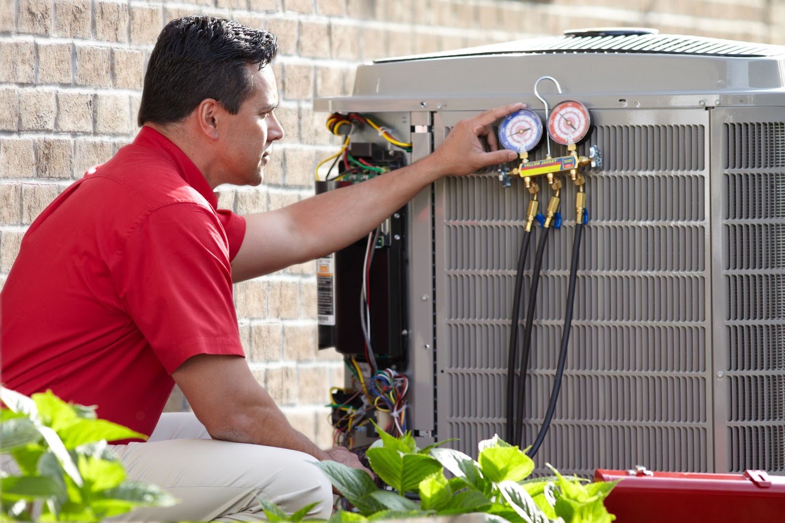 Man working on HVAC unit