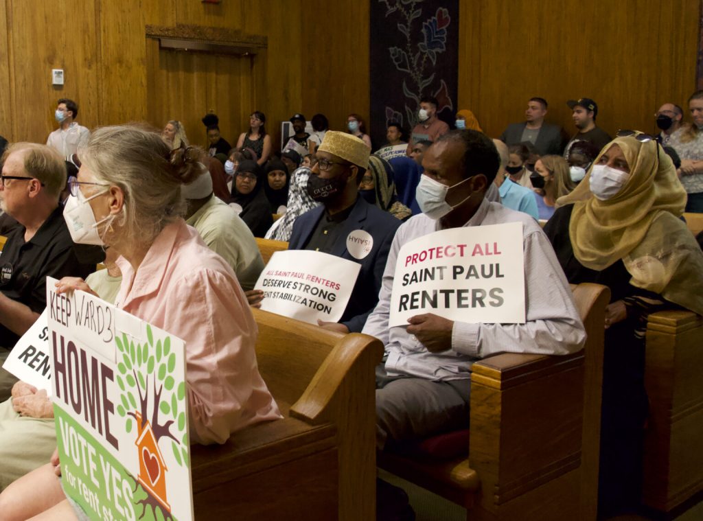 Renters and activists fill city hall demanding City Council maintain rent control protections. Photo by Max Nesterak.