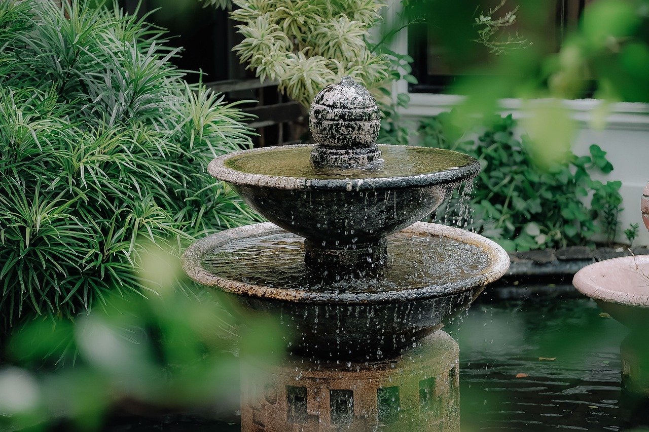 Stone water fountain in a garden