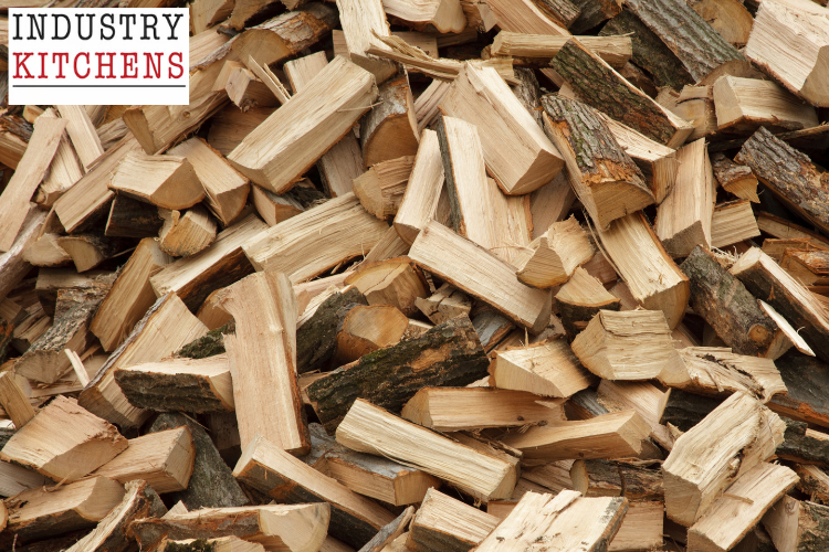 Quality hardwood pieces prepared for pizza oven fuel, demonstrating the importance of proper wood selection