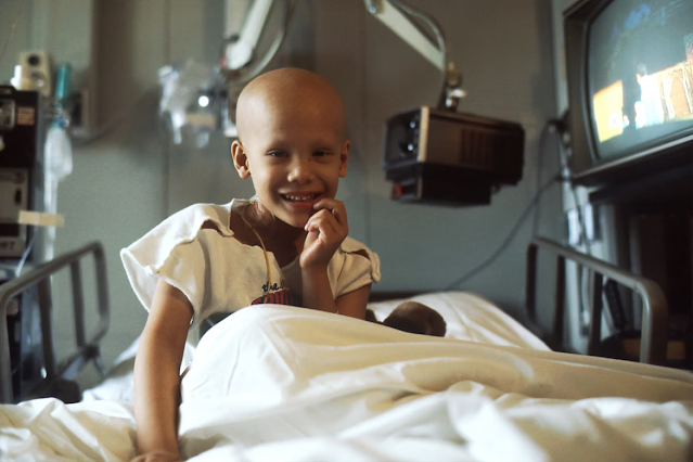 child in hospital smiling