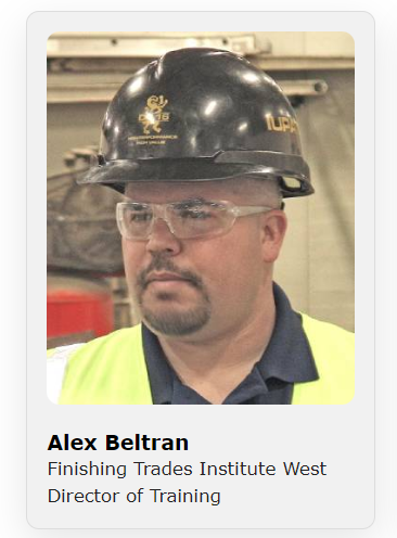 A person wearing a hard hat and safety glassesDescription automatically generated