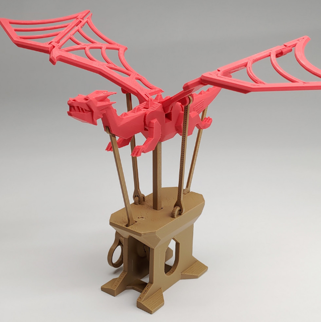 3D printed flying dragon automata with flapping wings, designed to mimic flight through gear mechanisms.