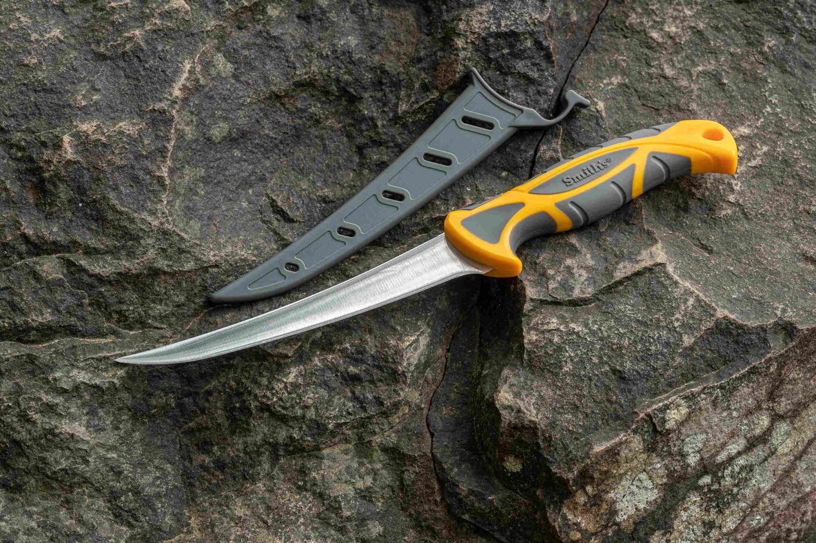 picture of a smith's fillet knife against a rock