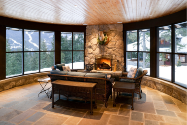 features to upgrade your home addition fireplace in sunroom with furniture custom built michigan