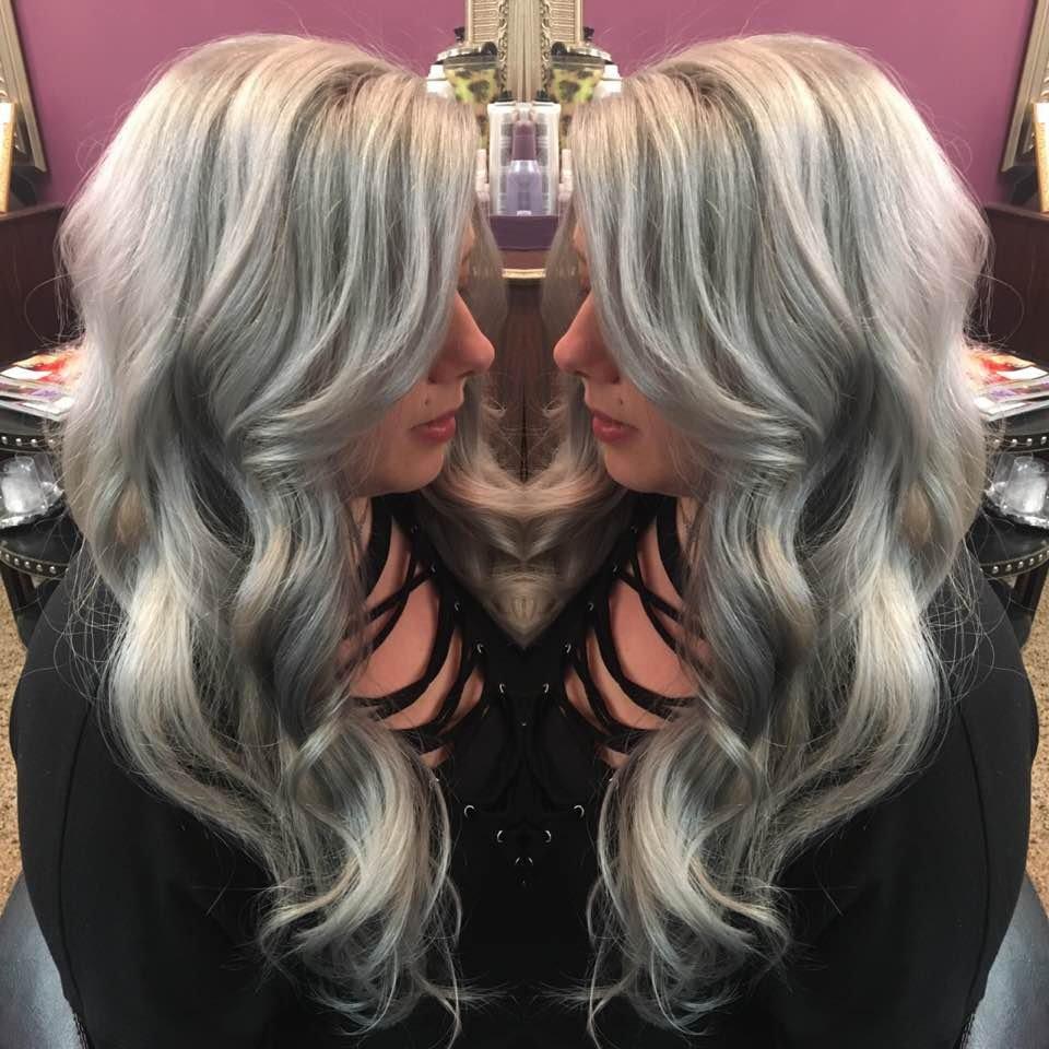 A girl with metallic hair color and extension