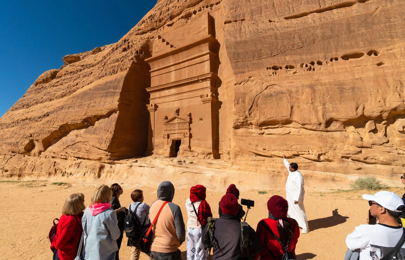 Tourists exploring a heritage site in Saudi Arabia - (Credits Arabian Gulf Business Insight)