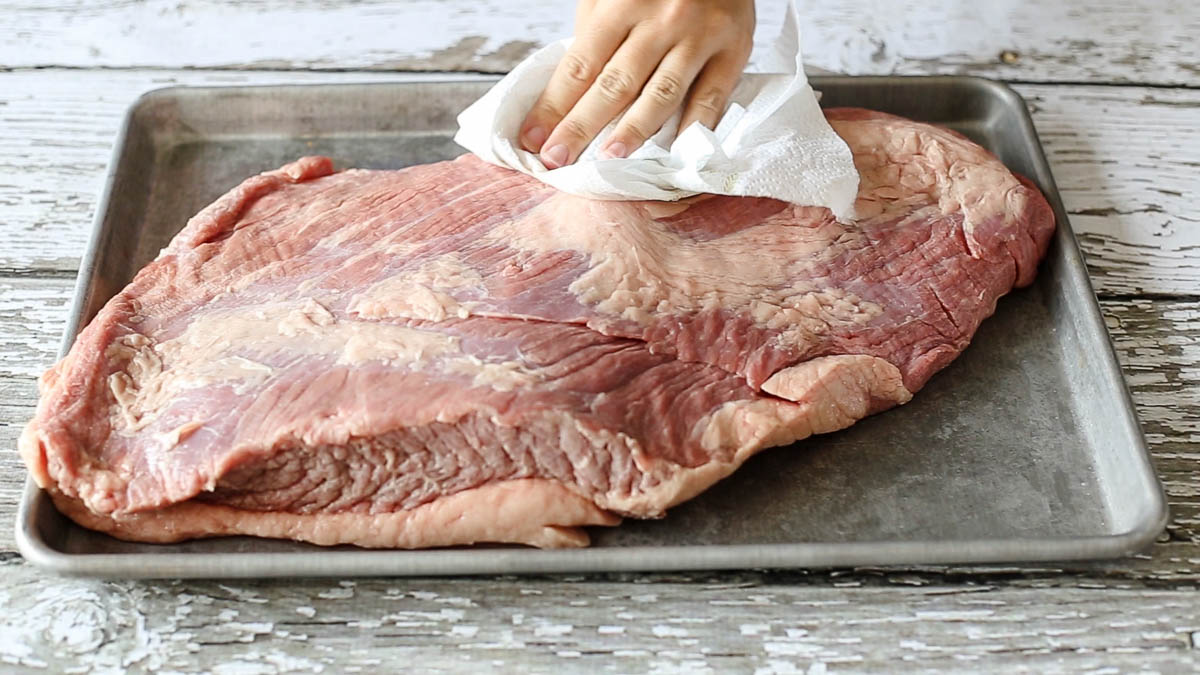 Pat dry the beef brisket prior to vacuum sealing