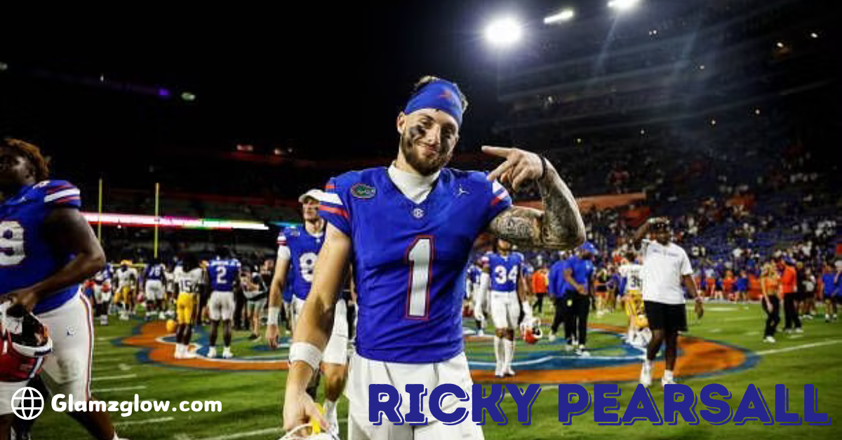 Ricky Pearsall, a football player in a blue Florida Gators uniform with the number 1, poses on the field after a game. He is smiling and pointing at the camera, with other players and fans in the background. The image features the text 'Ricky Pearsall' in bold blue letters in the bottom right corner, and 'Glamzglow.com' in the bottom left corner.