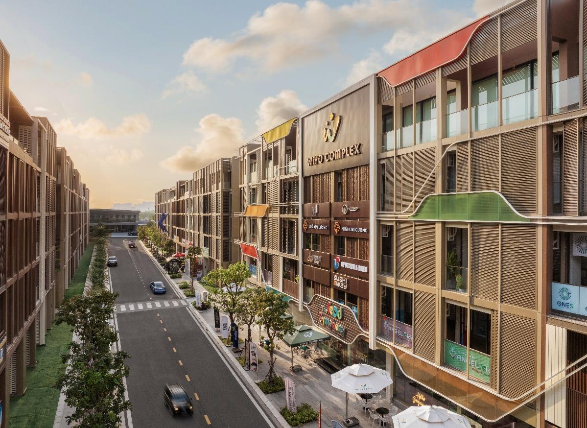 A street with cars and buildings    AI-generated content may be incorrect.