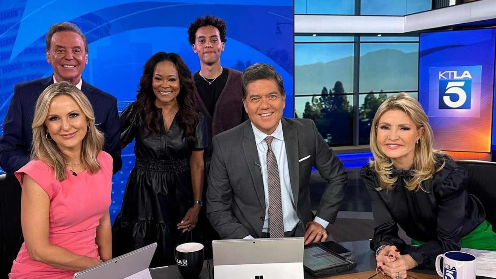 William Givens Jensen with family on a TV show