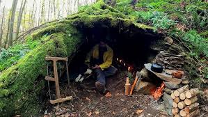 a rain-proof cooking station created for a rainy weather as one top survival hacks for rainy weather camping